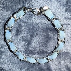 SILVER TONE METAL 7.25" CHAIN LINK BRACELET WITH BLUE FAUX SUEDE WOVEN THROUGH